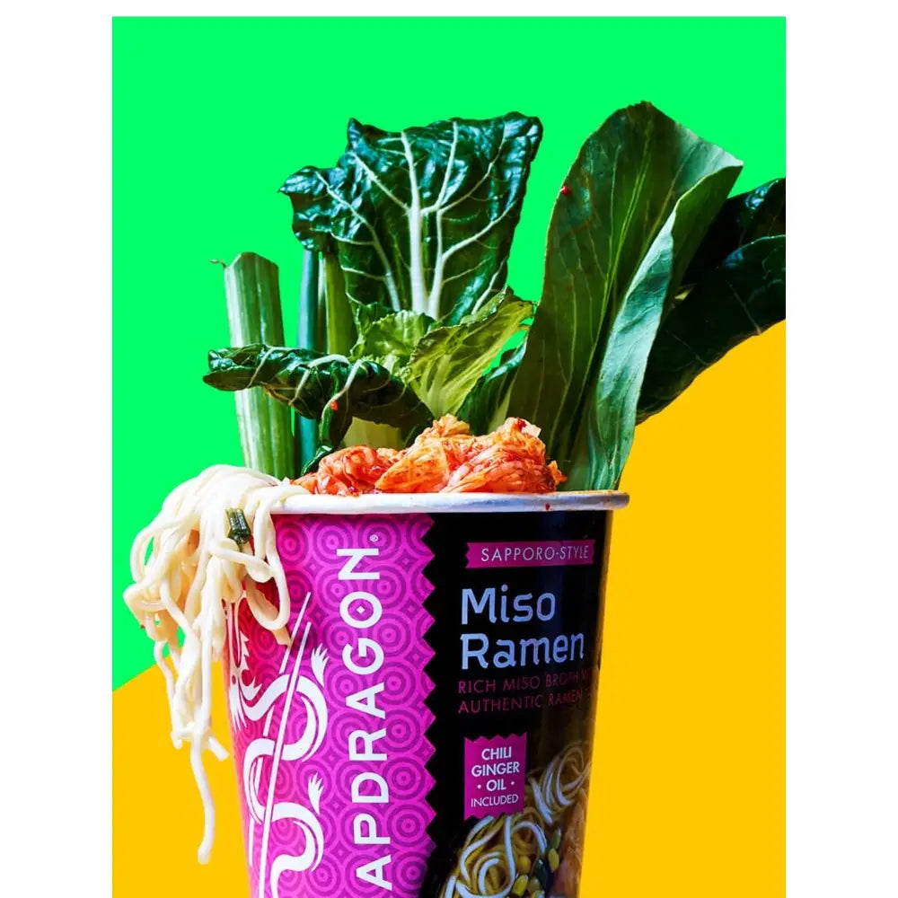 Fresh vegetables and ingredients for miso ramen on colorful background