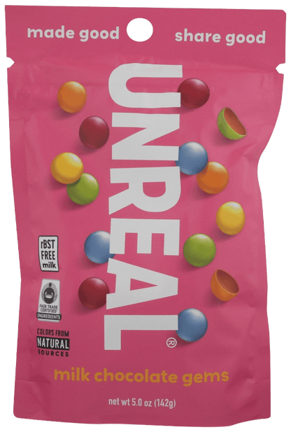 Unreal Milk Chocolate Gems 5oz pouch with colorful candy-coated chocolates, labeled rBST-free and fair trade. Ideal for guilt-free snacking.