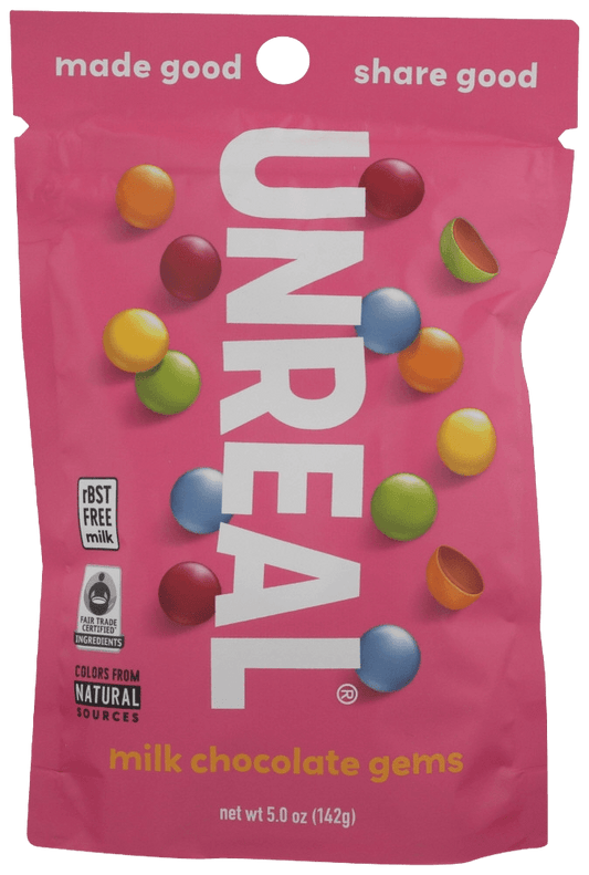 Unreal Milk Chocolate Gems 5oz pouch with colorful candy-coated chocolates, labeled rBST-free and fair trade. Ideal for guilt-free snacking.