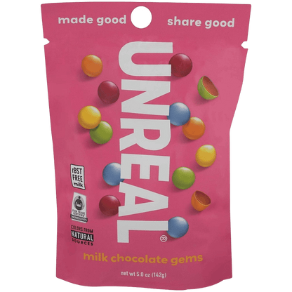 Front of Unreal Milk Chocolate Gems 5oz bag featuring vibrant candy pieces and fair trade certification. Great vegan-friendly chocolate snack.