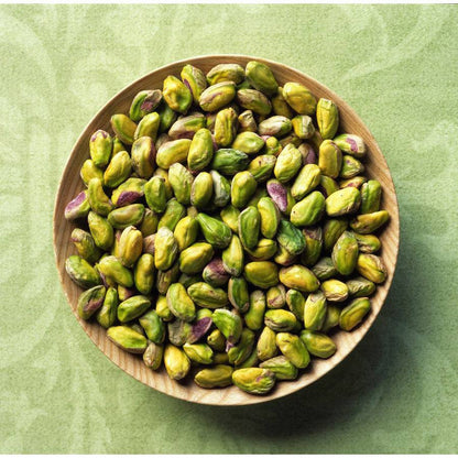Bowl of shelled roasted and salted pistachios from Wonderful Pistachios Multipack, showcasing fresh, vibrant green nuts for healthy snacking.
